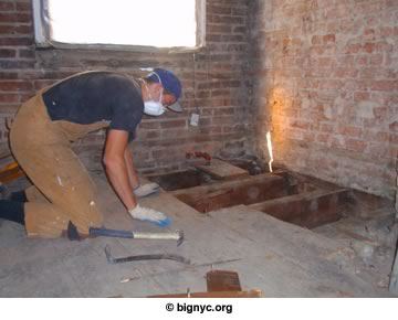 A Build It Green worker at work